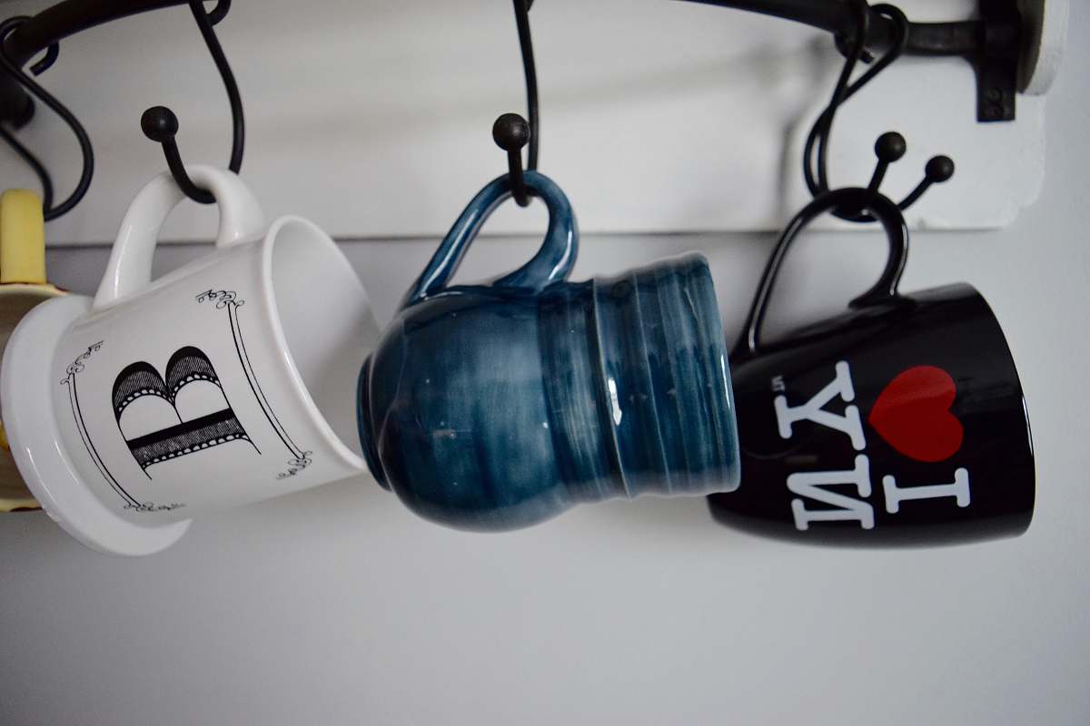 coffee cup three hanged assorted-color ceramic mugs mugs